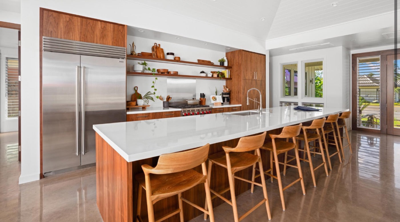 Walnut floating shelves in a modern kitchen